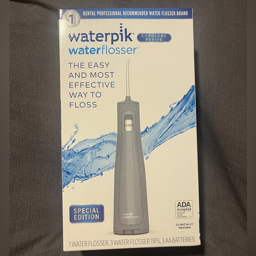 Waterpik Cordless Revive Portable Water Flosser Oral Irrigator,Modern Gray WF-03
